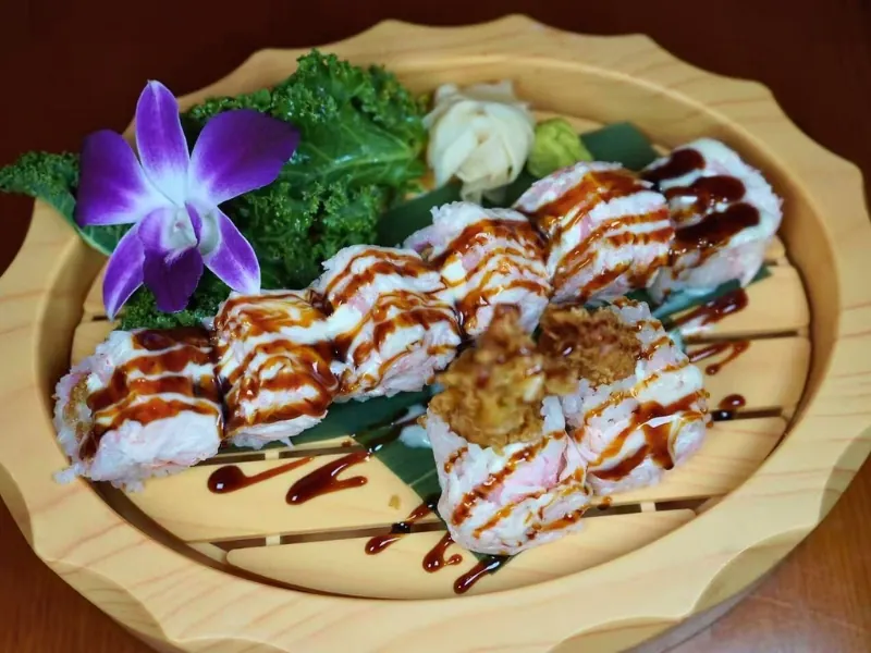 Creamy sushi roll with sauce & toppings at Koi Ramen & Sushi, a Japanese Restaurant in Johnstown